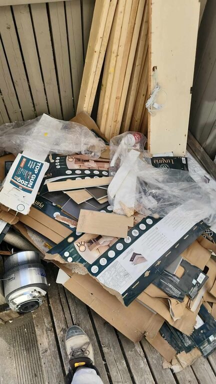 A pile of old electronics and circuit boards collected by Clearout Crew for responsible e-waste recycling in the Calgary area.
