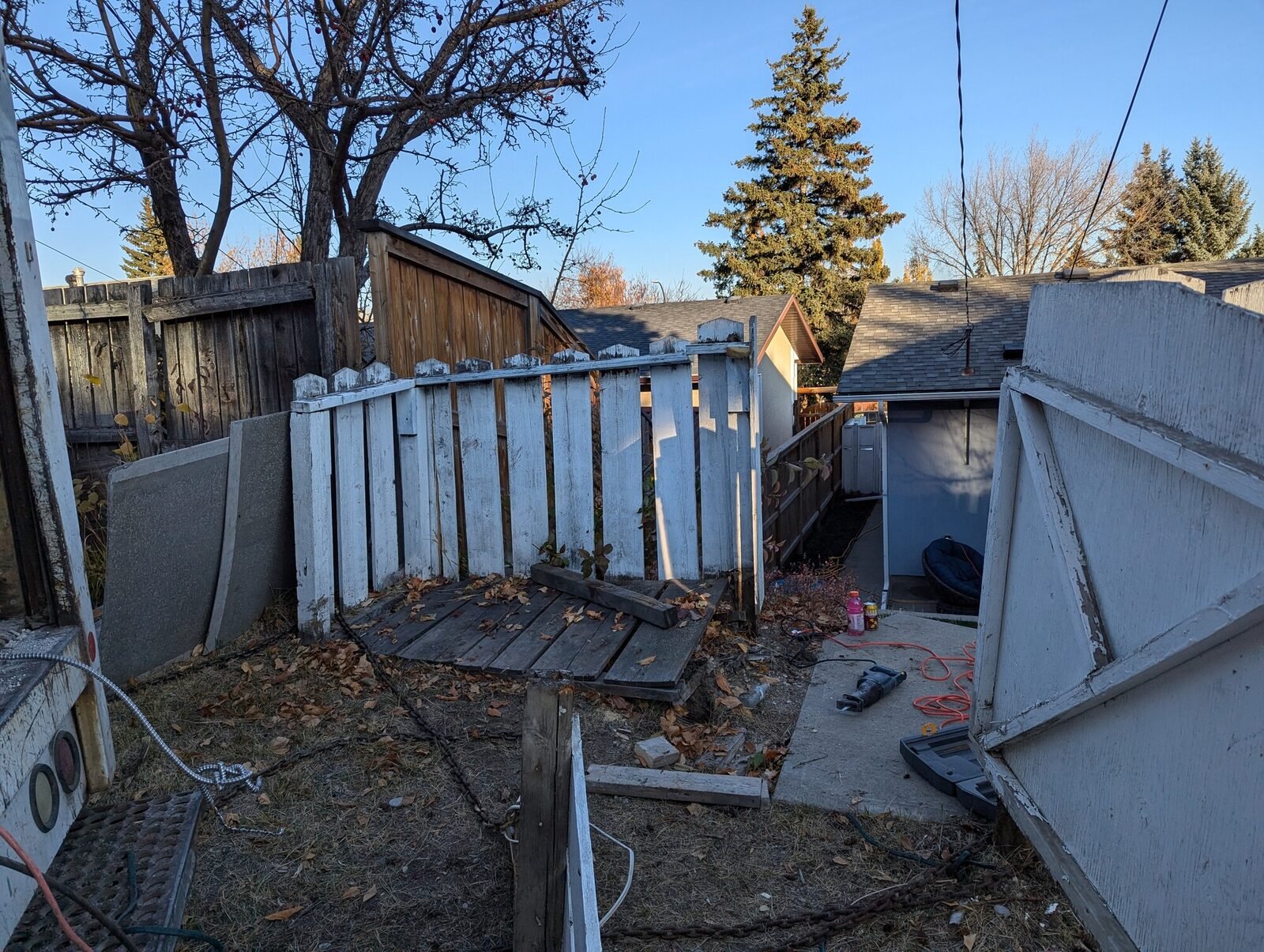 A backyard trampoline taken apart down to its metal frame, ready to haul away, on a Clearout Crew job in the Calgary area.